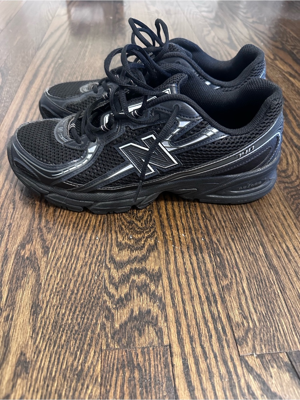 New Balance Black Men's Athletic Running Shoes with Silver Accents